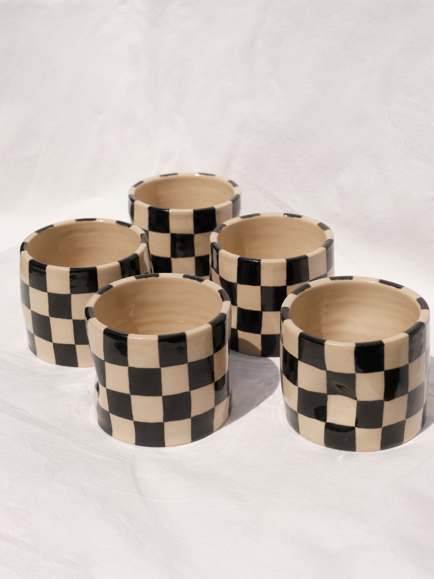 Checkered pinch cup